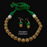 antique gold tone tribal green thread necklace