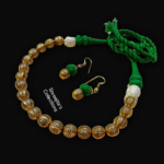 antique gold tone tribal green thread necklace