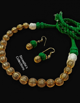 antique gold tone tribal green thread necklace